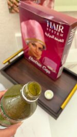 باكدج زيت الـ١٠٨ عشبة الهندي الأصلي + القبعة الحرارية هدية! - Image 2